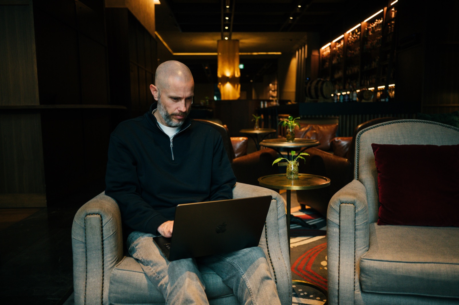 Daniel Bilsborough working with the agent on a laptop